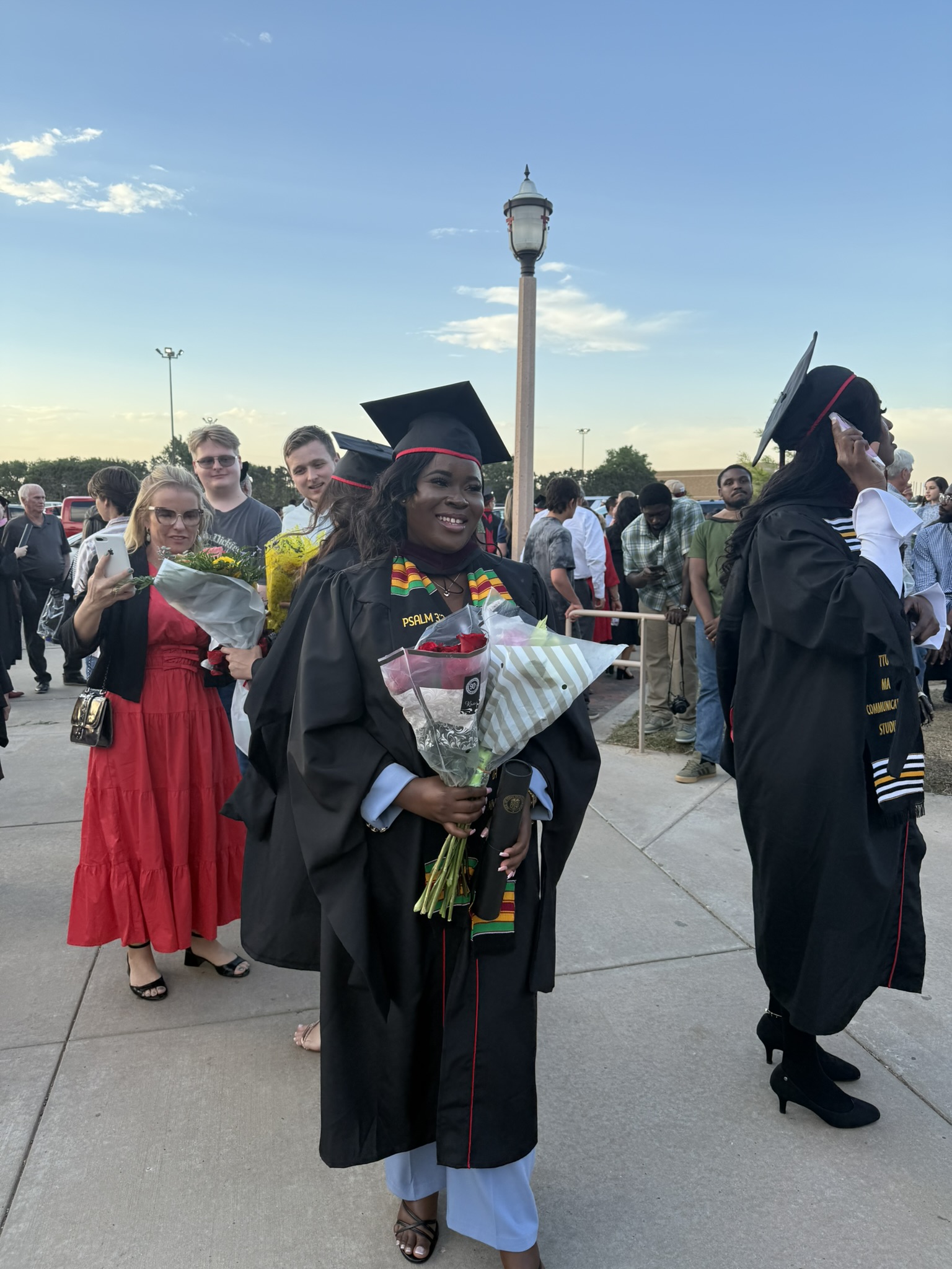 Me at my MA graduation at Texas Tech University, Spring 2026